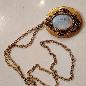 Floral hinged pendant gold tone chain 12" double oval blue porcelain center vtg